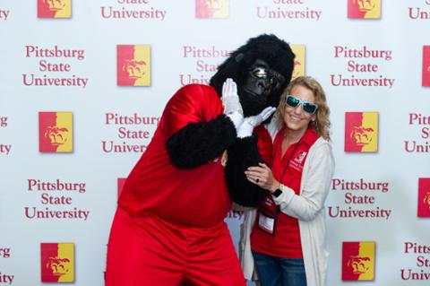 Gus the Gorilla and Becky, one of PSU's Team Coordinators, posing for the camera.