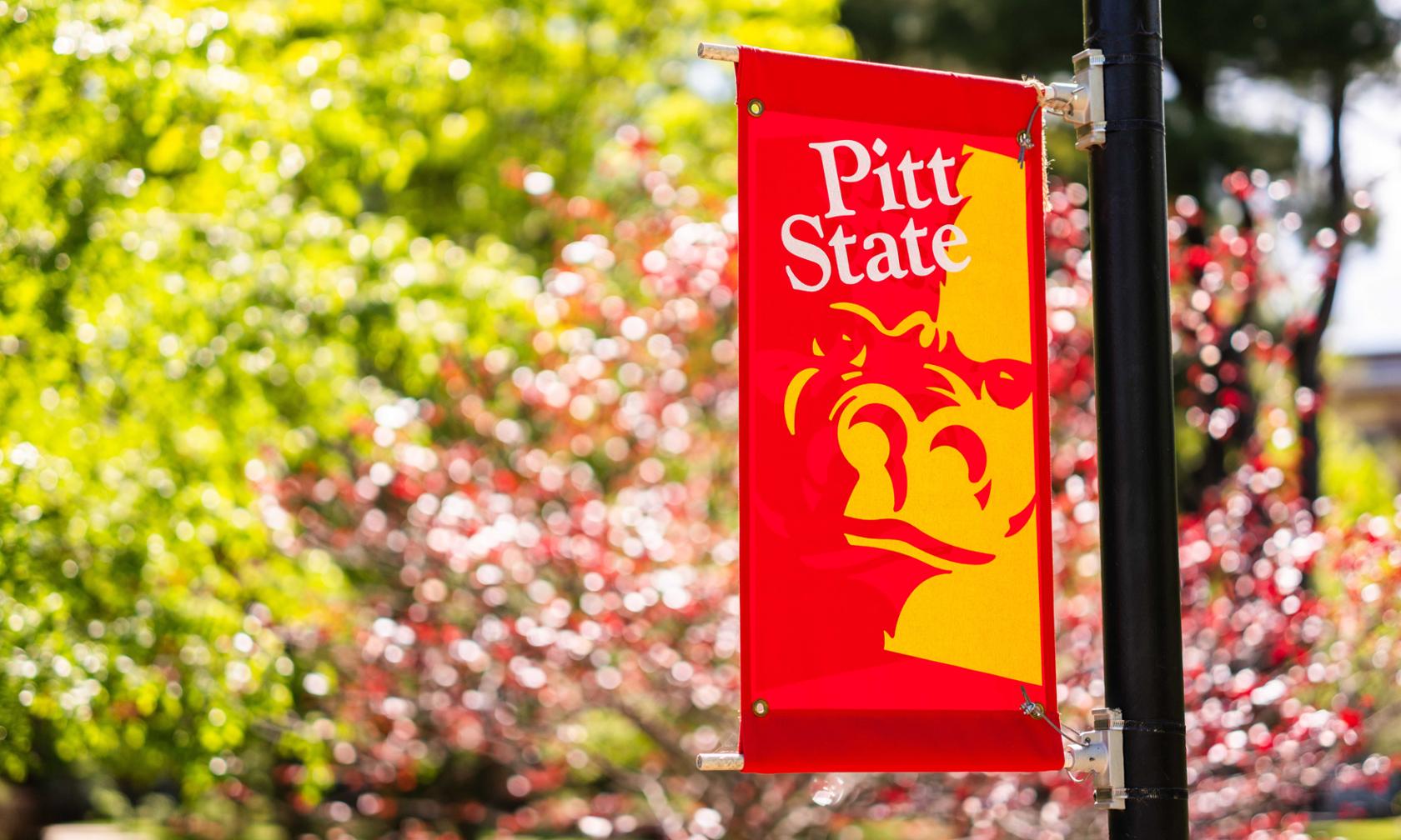 campus banner in the summer time