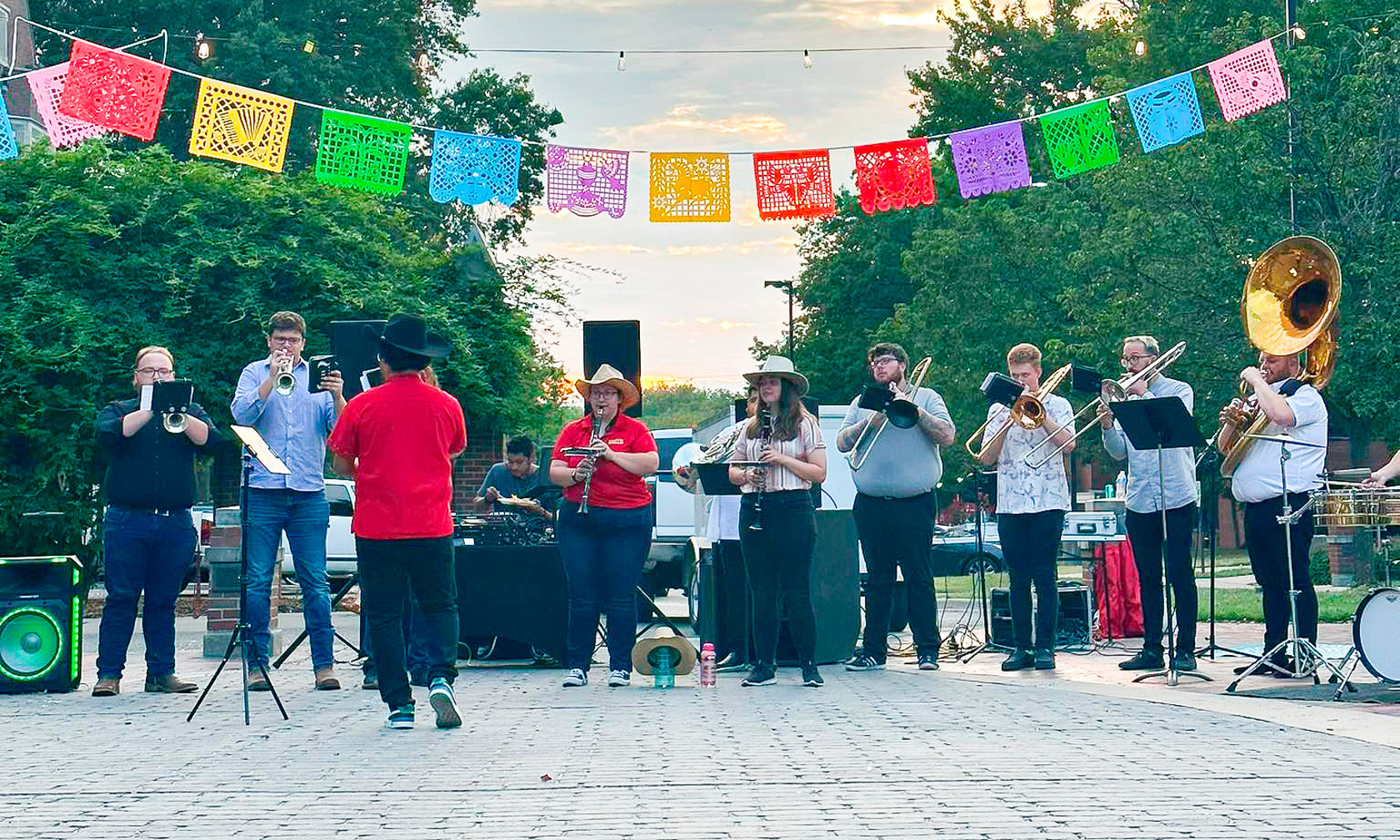 The Hispanic Banda plays at an event. 