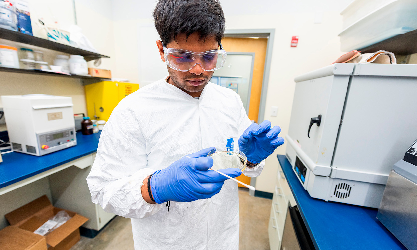 student working in lab