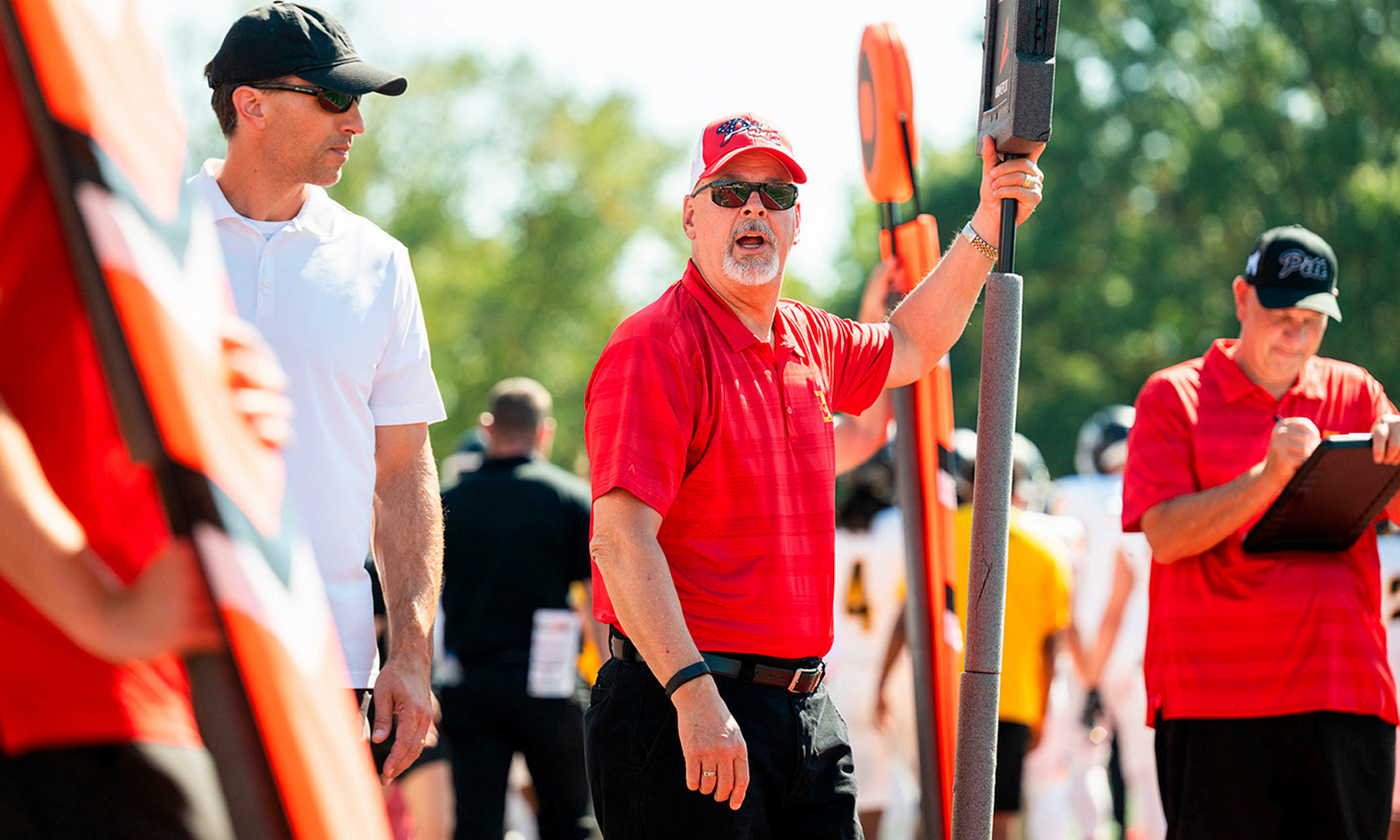 Dion Gartner working on the football chain gang