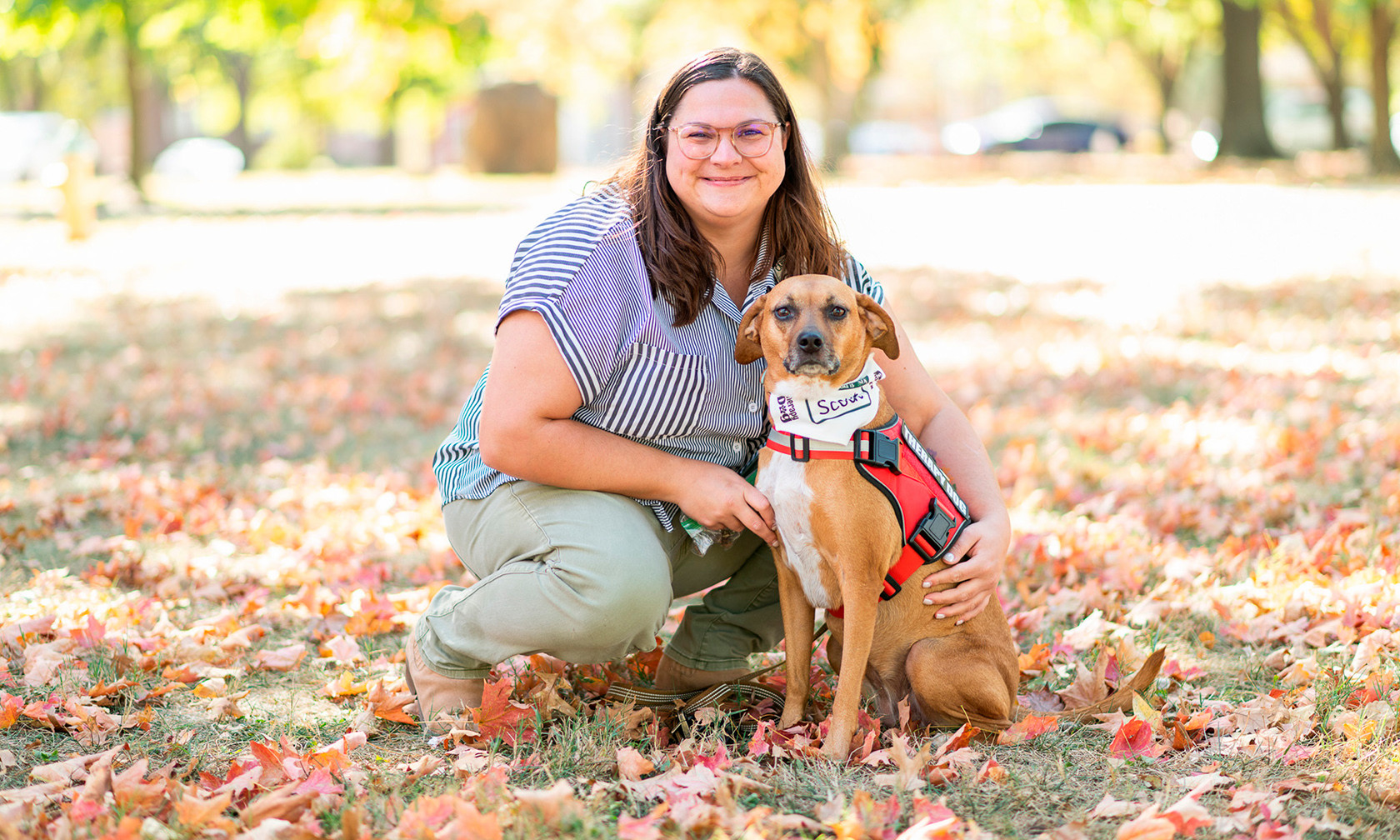 Therapy dog and handler outdoors