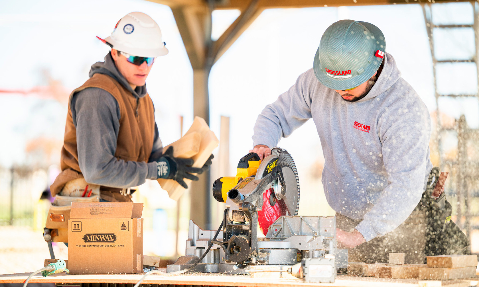 Construction students using power tools