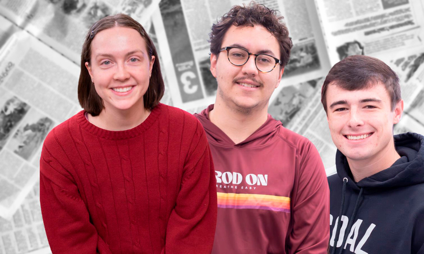 three students smiling