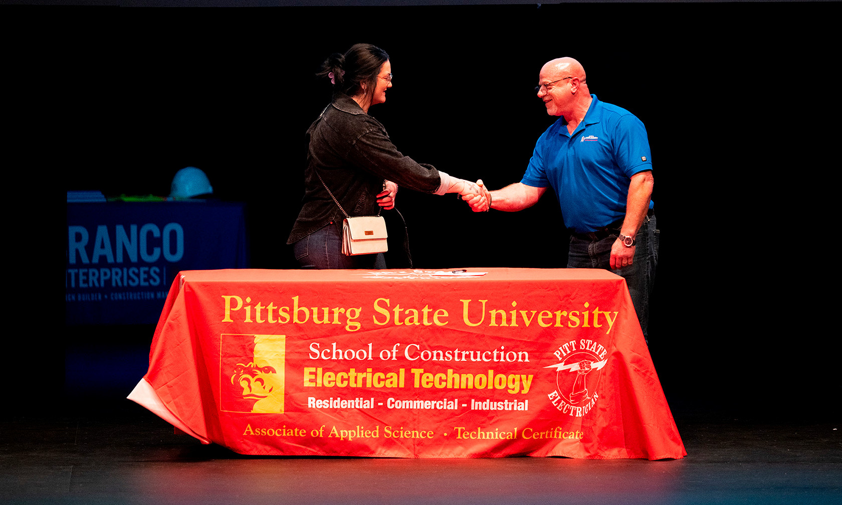 Student signing a letter of intent