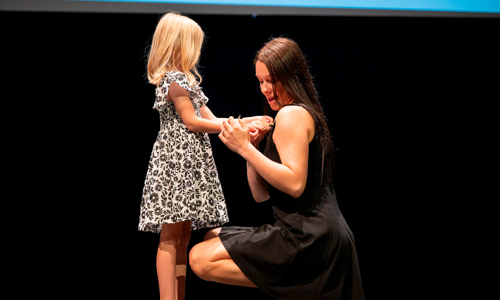 nursing pinning mom and daughter