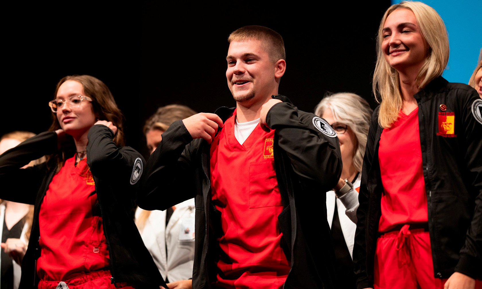 Nursing student in black coat ceremony