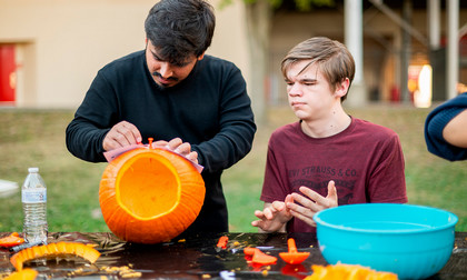 Pitt Pals pumpkin carving