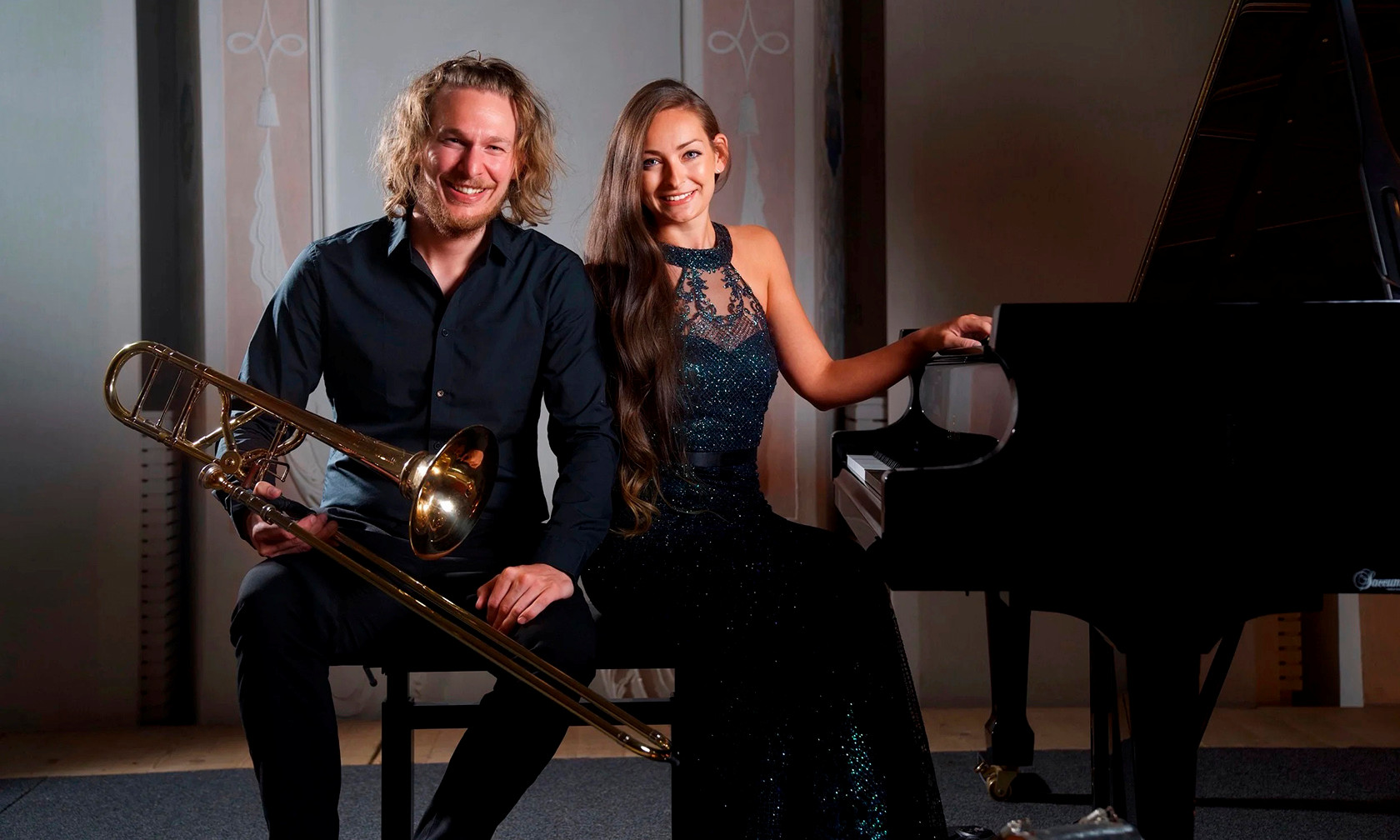 Musicians with trombone and piano