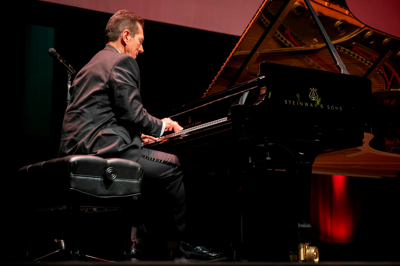 David Osborn playing a Steinway grand piano