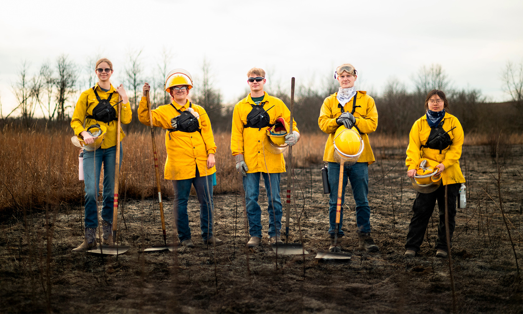 biology students on burned prairie