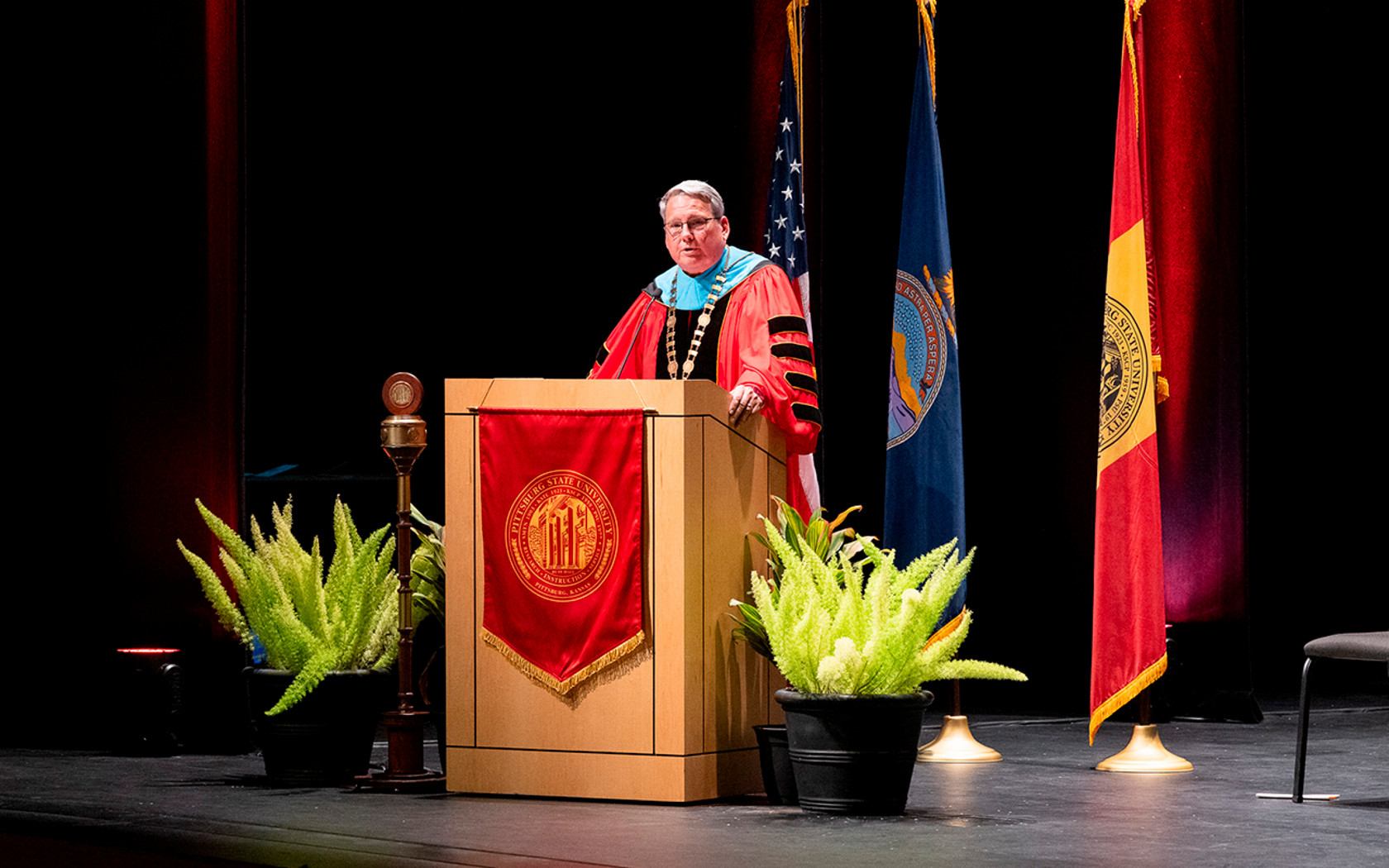 President standing at podium during ceremony