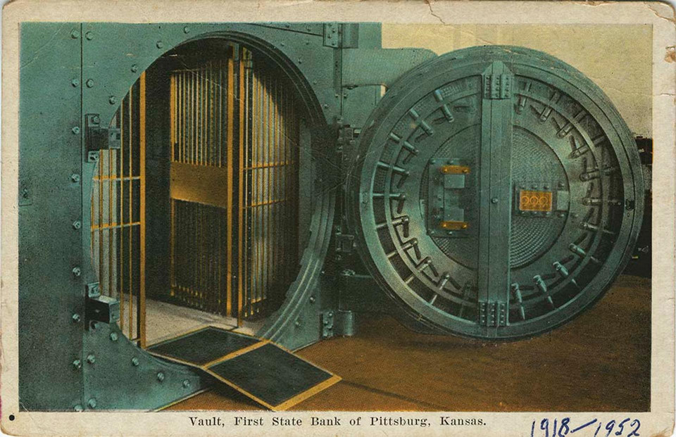 Antique photo of an open vault door